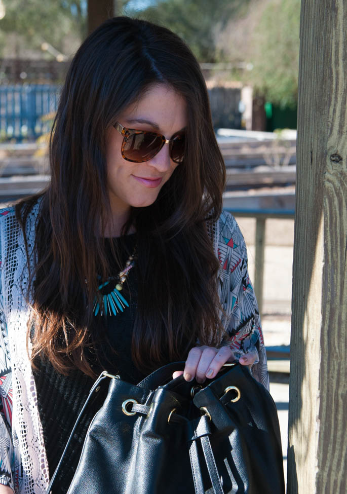 Patterned spring kimono with black bucket bag and black ankle boots