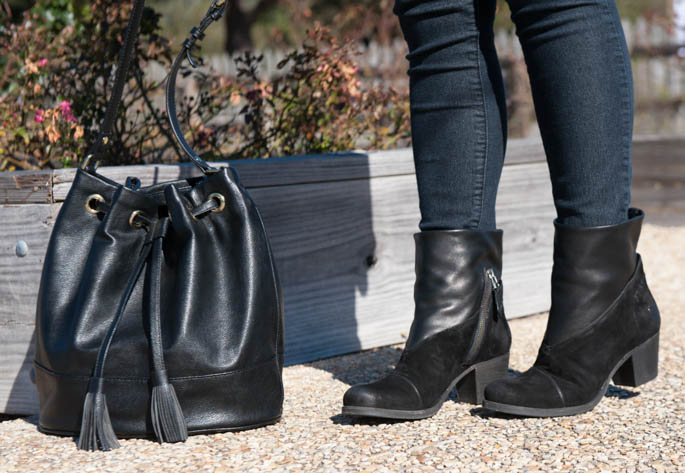 Patterned spring kimono with black bucket bag and black ankle boots